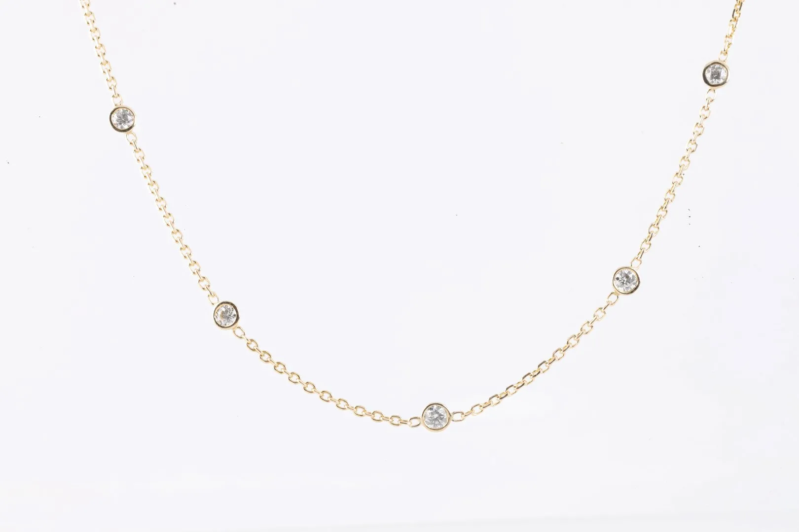 31" 14k Yellow Gold 1.65tcw Diamond Station Chain Necklace (7.98g.)